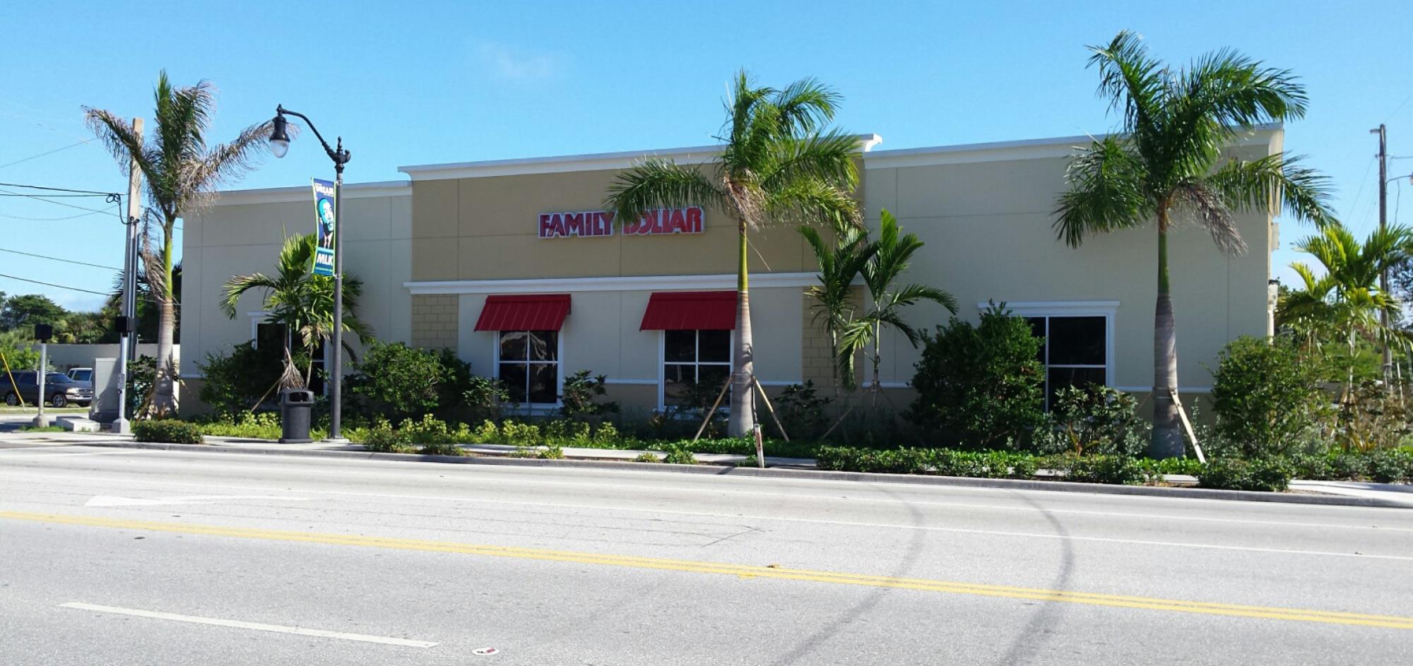 Completed Family Dollar Commercial Building View from East Side - Beige Building with Red Awnings