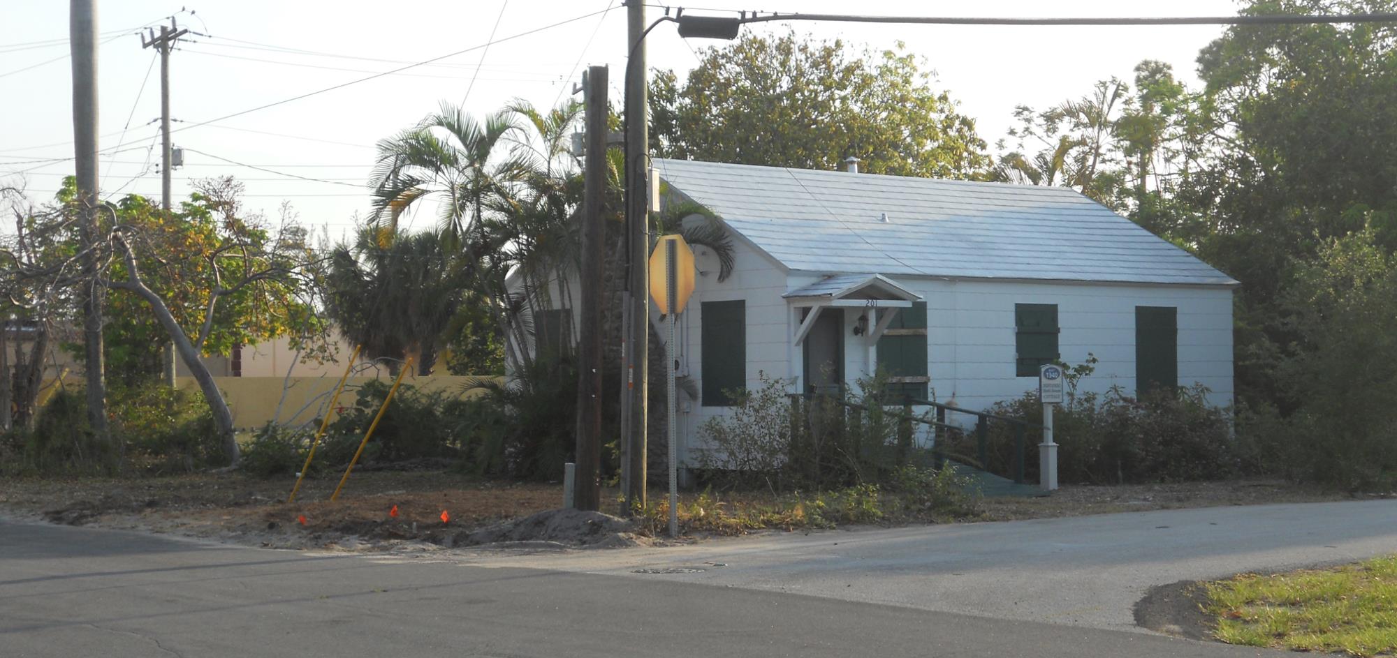 Exterior photo of historic Ruth Jones Cottage at original site