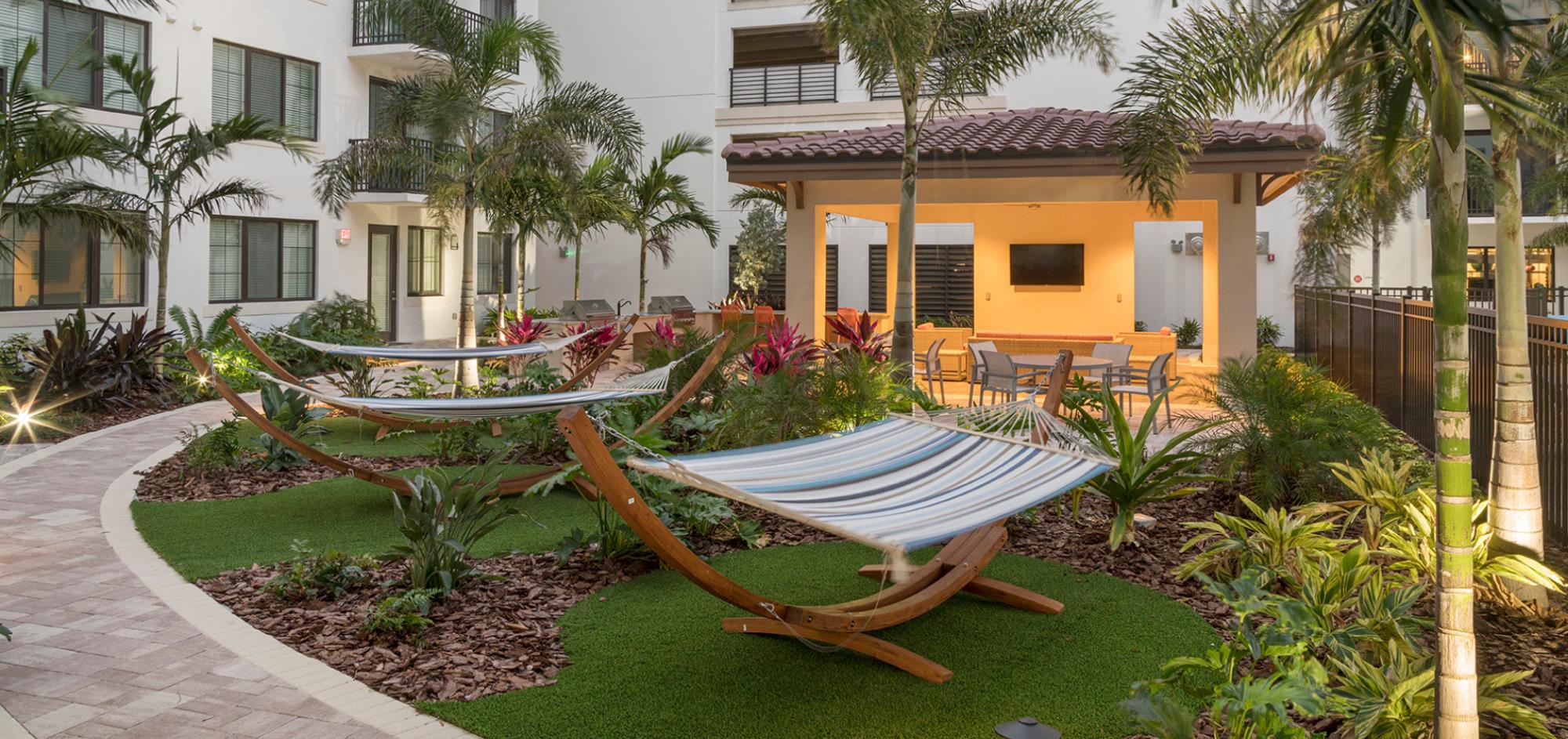 500 Ocean Amenities - Hammocks on a manicured lawn