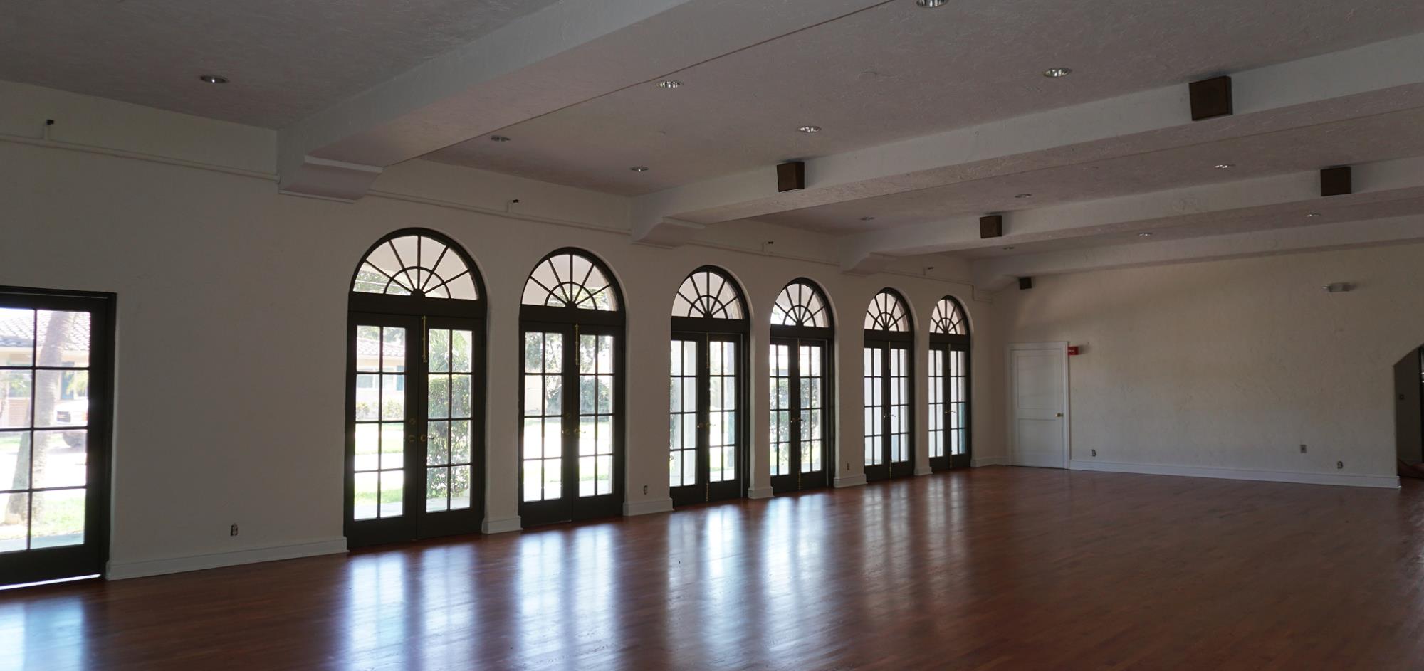 West Room featuring refinished wood floors and 6 French doors